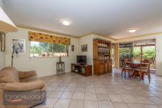3/2 Walker Street Mount Helena WA 6082 $375,000 Write your next chapter in a modern, light-filled, 2-bedroom, 1-bathroom, plus study home set in a delightful over 55s community. A strata development of only five freestanding homes, landscaped gardens and a stunning natural setting create a lovely Hills hideaway with style. A central open-plan design, surprisingly spacious backyard and an easy walk to the Mount Helena village deliver convenience and the freedom to craft the life you want. • 2 beds 1 bath plus study • 1997-built brick and iron • Spacious light-filled home • Main bed w semi-ensuite • OP family/kitchen/meals • Separate study/craft rm • Private paved verandah • Spacious low-main garden • Carport under main roof • Walk to village centre Make a move to a comfortable, easy-care home at the heart of the charming Hills’ village of Mount Helena. Within walking distance of local shops, medical facilities, vet, pub and park, the bright, spacious home sits in a small, well-maintained over 55s community. A verandah, edged with landscaped gardens leads to the front door and into a tiled entryway with a bedroom arranged at either side. The good-sized main bedroom is filled with natural light and features built-in robes, an overhead fan, R/C/ A/C and semi-ensuite access. The junior bedroom offers a welcoming space for guests with garden views and a built-in robe. The home’s heart is an open plan kitchen/meals/family room with reverse cycle air-conditioning. Double doors expand the central living area into a separate study/studio – flexible space, ideal for creative activities, quiet reading or screen time. The well spacious kitchen features an L-shaped bench with an electric cooktop and oven, under bench cabinets and a walk-in pantry. Tucked behind the kitchen are a large linen press and walk-through laundry. A wide sliding door links the open-plan area to a delightful and private backyard with a paved verandah wrapping the north-east corner of the home, a manually reticulated garden planted with flowering natives, and a small garden shed. A separate, powered storage room could be used as a small workshop, to store tools and tinker. A gate in the rear fence leads to a communal area planted with fruit trees. Don’t miss your chance to downsize without compromise, discover the joys of Hills’ living and the charm of Mount Helena.