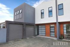 3/32 Burns Street Maidstone VIC 3012 $790,000 - $840,000 This three-bedroom townhouse epitomises spacious and bright living; wrapped up in one of the most desirable streets in Maidstone. Space poses no issue in the dining and lounge area of the home, where large floor to ceiling windows that face out upon the large backyard allow for light to fill the room. A study nook accompanies this space. Enjoy cooking with ease in the stylish and sleek kitchen, with stone benchtops, a double sink, an abundance of cabinets, tiled splashback, chrome accents, European gas appliances and an island bench. A central powder room and separate laundry with backyard access completes this lower level. Newly carpeted stairs guide you to the upper level of the home. The enormous master suite has a prodigious walk-in robe that fulfils all your storage needs and a generous ensuite complete with an oversized shower and vast vanity space. The second and third bedrooms are large, and light filled and are both serviced by double built-in robes. The upper level is completed by a central bathroom with a tub, extended vanity space and ample storage. Located less than 10kms from Melbourne’s city, a range of amenities are made readily available to you. Indulge yourself at the many surrounding cafes and restaurants, unleash the shopaholic within at Highpoint Shopping Centre, travel from the nearby bus/tram stops or immerse yourself in nature at the Maribyrnong River and multiple parklands/reserves close by. Additional features: – Separate laundry with backyard access – Security camera and intercom – Double garage with internal access – Split system heating and cooling in lounge area, master bedroom and upper level – Generous and low-maintenance backyard..