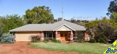 6 Henty Pl Northam WA 6401 $479,000 Located in a peaceful area (Woodley Farm) with a family orientated lifestyle and is positioned to capture the fantastic rural views. The property is complete with 4-bedroom 2-bathroom, double brick and iron roof and quality fixtures throughout featuring Laminating flooring and tiles. Presents as new. As you walk through the front entrance, this 1995 spacious living home combines of a good-sized main en-suite bedroom to your right which includes air-conditioning and walk in wardrobe, then to your left is the stunning lounge room that has enough room for the whole family to enjoy. Walking through to the heart of the house is the expansive open plan kitchen and dining area, the kitchen boasts plenty of storage, benchspace, gastop cooking, electric oven, dishwasher and enjoys an outlook to the patio and paddocks beyond. The dining area includes a fire place for cosy winter days. To the right of the kitchen is the theatre/games room which includes a projector and bar to enjoy movie nights!! Located at the back of the house is 3 comfortable bedrooms which 2 includes B.I.W & evaporative air-conditioning. Separate toilet to laundry and bathroom opposite. Making our way outdoors! The entertainment area is perfect for hosting the largest of gatherings or just keep if for yourself as it is, the spa is included which is the perfect place to sit back, relax and listen to nature well enjoying a nice cold beer or glass of wine. Plenty of room on this 5,103m² block to expand! Shed rear access Property also features: - Solar - Concrete floor shed 6m x 6m - double carport garage - Garden Reticulated - Septic Tanks - Floor size 182m2 - Year Built 1995…