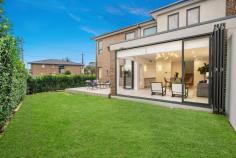 24B Smalls Road Ryde NSW 2112 $1,800,000 Ideally positioned just footsteps to Smalls Road Public School, this flawlessly presented duplex offers modern interiors, ample space and privacy. Its house-sized proportions creates a family-friendly atmosphere and an easy-care way of life. A secure, fenced garden provides safety for young children and pets to play together, combined with a north-facing alfresco ideal for entertaining or relaxing in the sunshine. Situated between Top Ryde City and Macquarie Park, the home also is within close proximity to Yamble Reserve, Midway shops, regular city transport and leading schools. - Immaculately presented throughout, street access from Neville Street - Spacious living areas connect with easy-care gardens and level lawns - Gas kitchen with Smeg appliances, 40mm stone bench and breakfast bar - Powerful and quiet ROBAM rangehood removes odour from the kitchen - Master suite includes bespoke walk-in-robes and a lavish ensuite - Main bathroom has a rainwater shower head, oval bath, luxe tiles - Prestige finishes throughout, tall shadow line ceilings, custom lighting - Zoned ducted air-conditioning, alarm system, plenty of storage