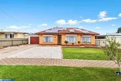 61 Northcote Drive Para Hills West SA 5096 $349,000 - $365,000 On an appealing street offering easy access to public transport, schools, local reserves, sporting facilities and shops, this double brick 1960's home features lovely updates and a spacious floorplan. While the three bedroom home is certainly stylish and comfortable, the generous 585m2 block does provide the potential to stamp your mark if you wish. Perhaps a family room extension down the track, a sensational alfresco area, a swimming pool, veggie garden or a trampoline for the kids. There is room for additional vehicles, workshop projects, tools or equipment in the huge garage complete with a sliding door and concrete floor. Families, first home buyers and investors will love the fresh feel created by stylish new flooring and window furnishings, modern kitchen facilities and a stunning bathroom with floor to ceiling tiles. The floorplan showcases a formal entry, three gorgeous bedrooms, a large lounge flowing to the exceptional dining and kitchen area and a modern bathroom with a separate w/c. Additional features include: -Wide street frontage of 18.29m with driveway parking -Solar panels for reduced energy costs -Updated kitchen with gas cooking, double sinks, big pantry -Large lounge with split system a/c -Bedrooms with ceiling fans, one with split system a/c and one with a modern built-in robe -Carport with auto roller door -Laundry with linen cupboard -Continuous flow gas hot water -Verandah for outdoor dining -Roller shutters In a convenient location, this is a fantastic home for families and a great investment property. For further information contact Jakub Ratajczak on 0448 114 454.