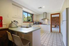 29 Hartwig Road Wodonga VIC 3690 $499,000 Located in a family friendly area set amongst quality established homes in the ever-popular Willow Rise Estate sits this solid brick home offering 4 bedrooms, master with ensuite and walk in-robe. On entry you will find a large lounge room with a balcony to take in those great north facing views. An updated kitchen with dishwasher and stainless-steel appliances is adjoined by a spacious tiled meals/family area with a wood fire heater. The home also offers instantaneous hot water, refrigerated cooling and ducted reverse cycle heating. The double lock up 9m x 8m garage and workshop has abundance of storage under the house and has side access. An excellent Wodonga location close to schools, parks and popular walking tracks. FEATURES: • Air Conditioning • Built-In Wardrobes • Close To Transport • Garden