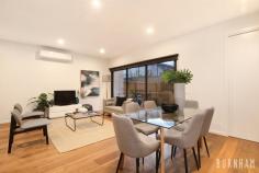  2/87 Spencer Street Essendon VIC 3040 $730,000 - $780,000 Located in one of Essendon’s most favourable streets, positioned directly across from Buckley Park, is this contemporary, near-new, two-bedroom townhouse. The home combines space, style and convenience; making living completely effortless. Entertaining is easy with a sizeable kitchen that boasts Caeser stone benchtops, stainless steel appliances, an abundance of storage space and a mobile island bench. The kitchen seamlessly flows to the spacious, versatile and open-plan dining and living area which opens to the home’s private backyard. Light envelops this lower level as windows encompass both the kitchen and living/dining area. This space is serviced by a separate powder room. Timber floors guide you to the upper level of the home, where you are met with two large, double bedrooms with generous, white glass, built-in robes with storage. These rooms are conveniently serviced by an extra-large, central bathroom, which flaunts a 1.5m frameless shower, stone benchtops and floor to ceiling tiles. This level is an oasis of calm as it becomes the perfect place to unwind at night and awake in the morning. Primely positioned, only 10kms from Melbourne’s city, this home’s location is simply unsurpassable. It lies within many of Essendon’s coveted school’s zoning, has numerous reserves/parklands surrounding, is close to the Maribyrnong River, Highpoint Shopping Centre and many other shops, cafes and restaurants. Everything you need is within an arm’s stretch. Additional features include: – Plush carpets in bedrooms – Split system heating and cooling in the bedrooms and living area – Storage shed – Bike rack – Clothesline – Security and alarm system. 