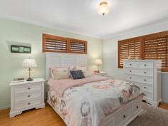 27 Sequoia Close Elanora QLD 4221 This well-appointed family home is situated on a massive 929m2 flat block in an excellent location at the end of a quiet cul-de-sac adjacent to lakes and parkland and has been fully renovated with quality finishes throughout. • Gourmet kitchen with stone tops and marine grade cabinetry; • Separate internal living areas opening to the covered entertaining area; • Outdoor living area overlooking the huge resort pool with waterfall feature; • Luxury bathrooms with floor to ceiling tiles and quality fittings; • Bamboo flooring throughout the living areas; • Fully ducted reverse cycle air conditioning throughout with individual zoning; • Solar power, solar hot water, plantation shutters, fully insulated ceilings, large water tank; • Double lockup garage, double carport plus off-street parking for caravans or boats; • Manicured tropical lawns, gardens and fruit trees, large lockup storage shed; • Direct access to the park, lake, and walkways at the end of the col-de-sac. The home is in a much sought-after location, with an easy walk along the lake to The Pines shopping centre, close to PBC high school and is less than two kilometres to the beach and Currumbin estuary.