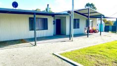 57 Hill Street Waroona WA 6215 $365,000 * 4 bedroom 2 bathroom home. * Fully renovated from top to bottom. * Big separate master bedroom away from minor bedrooms with amazing ensuite fully tiled from floor to ceiling. * All bedrooms have built in robes, the master has a walk in robe. * Tile fire centrally located in the centre of the home. * Split system air-conditioning. * Huge 1034m2 corner block. * Fully fenced to utilise the whole block. * Side access with automatic gate. * Plenty of parking for boat or caravan. * DREAM 17 x 7.5m2 brick man cave / garage/ shed with roller door, toilet, bar, air con and tile fire. This is absolutely brilliant I love it. * Separate small work shop. * Chook pen. * Rear patio entertaining. * Perfect lock and leave very secure with fencing and security system. This property is walking distance to schools, recreation centre, sporting ovals and golf course.