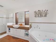 8 Erlistoun Street GOLDEN BAY WA 6174 $699,000 If your after lazy days by the pool, a stroll to the ocean, lots of room to entertain and to be surrounded by lush tropical gardens then this is the home you have been waiting for! This Dale Alcock loft home sits on a huge 890sqm block of coastal land, is stunningly presented both inside and out and has drive through access to the large powered workshop at the rear. This beautiful home is located just 200m to the glorious beaches of Golden Bay and within easy access to transport, local shops medical, dental, schools, sporting and community facilities. The freeway is also a short drive away making access to Perth & the South West a breeze. This property has too many features to mention but here a just a few; • Two storey loft home • Three living areas • Huge master suite • Large secondary bedrooms with built in robes • Ducted reverse cycle air conditioning • Solar power • Below ground pool • Alfresco entertaining • Double garage with drive through access • Large powered workshop • Manicured gardens • Auto reticulation from the bore Viewing is essential to fully appreciate this property, call Aaron Rolt on 0406 301 229