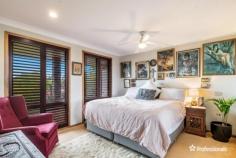13 Palisade Way Lennox Head NSW 2478 $1,200,000 In a highly sought after pocket of Lennox Head, 13 Palisade Way enjoys an elevated street position offering beautiful ocean views overs Sharpes Beach. Set on a generous 933m2 block which is becoming harder to find, the property features an in ground pool, fire pit area and is landscaped with a selection of producing fruit trees including Finger Limes, Bananas, Mangoes, Mulberries, Starfruit and various citrus trees to name a few. The house itself is in original but sound condition and a cosmetic makeover will quickly see the property restored to its former glory, to a level befitting the revered location. • Ocean views over Sharpes Beach • Salt water in ground pool • Large 933m2 block with an assortment of fruit trees • Covered outdoor entertaining area • Separate lounge room with wood heater- perfect for winter • Master bedroom with en-suite and WIR..