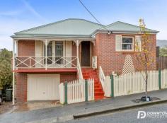 8 Glebe Street Glebe TAS 7000 $695,000 Immaculately presented throughout and set on the City of Hobart’s doorstep, is this premium brick home offering the ultimate convenience whilst still being so private. This wonderful stand-alone townhouse would make the ideal property for professional couples, downsizers or investors, the city fringe location ensures an active lifestyle close to all amenities. Upon entering, you are immediately impressed by the enclosed porch offering a serene place to sit and admire the city skyline. Features continue inside with neutral colours, some timeless finishes and a lovely sense of space and light. Accommodation provides a generous open living space with the large lounge room flowing onto the dining area and kitchen. The quality timber kitchen offers loads of cupboard and bench space and ample room for a fridge. There are two good size bedrooms both with built in robes, separate toilet, laundry and the home is serviced by a very neatly presented family bathroom. Outside, the landscaped gardens are well maintained and provide privacy. There is an external door providing access to the single garage and additional storage. City living does not get any better than this. This home is a short walk to the CBD, hospital and to many restaurants and café. If you are looking for a property with character, one which is charming, well-maintained and a much-loved home than 8 Glebe Street is sure to impress upon inspection. – Charming 1987 brick home on city’s doorstep – Tightly held and sought-after location – Double glazed windows – Generous open living space with quality heat pump – Two spacious bedrooms – Established landscaped gardens – Single garage – Additional under house storage – Short walk to the CBD, Aquatic Centre and Royal Hobart Hospital..