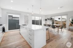 14 Mary Drive Alfredton VIC 3350 $715,000 - $730,000 This stunning family home is sure to impress upon immediate entry, showcasing modern, sophisticated living. Situated on a generous sized allotment of 630m2 (approx) & located in the exclusive Alfredton Central estate, the location & property on offer is of the highest standards & is sure to amaze. • This brand new Hudson Ridge home is a complete family set-up boasting four bedrooms, 3 with BIR's plus the incredible master suite comprising of a huge WIR complete with joinery & a luxurious dual vanity ensuite with separate toilet. • Upon entering through the 1200mm wide front door, the impressive 2.55m high ceilings & feature lighting ooze quality & class and set the tone for the entire property • There are two separate living zones including front formal living room with built-in study nook & entertainment unit plus an open plan family room with premium gas log fire creating a sense of ambience • The kitchen is simply stunning and offers gas & electric cooking, Caesarstone bench tops, breakfast bar & incredible walk-in pantry with plumbed fridge space • Some of the other standout features include ducted heating & refrigerated air conditioning throughout plus quality fittings & fixtures • Beautifully landscaped with low maintenance in mind, there is a large, undercover entertaining area & a separate fire-pit area • Completing this impressive home is the oversized double lock up garage and secure side access to store your caravan, boat or trailer • Ideally located in the Alfredton Central estate, close to multiple high schools, Lucas shopping & the Ballarat Golf Club.