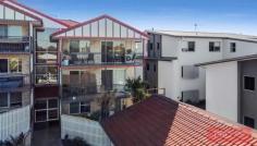 5/45 Oliver Street Nundah QLD 4012 This unit presents like no other and will suite all those who want a "nothing to do but just move in" property, well here it is. A Top Floor Penthouse style unit with front and rear balconies, City and Suburban views and is perched high in one of Nundah's quiet streets while still maintaining an easy walk into the Village for that coffee fix. On entrance this unit is sure to impress starting with the kitchen with all new cabinetry, stone tops, breakfast bar and Induction Cooktop not to forget that all important view. The Lounge and Dining are separate, fully tiled, air conditioned and open out onto the larger of the two balconies. Moving down the hall are two spacious built in bedrooms that open out onto the rear northern balcony to catch the flow through breezes, the main with a sizable ensuite. The main bathroom includes a bathtub and laundry combo to make life easy. Intercom locked foyer for your added security and garaging is a one car remote but who needs it with this location. This property is a MUST INSPECT, contact Peter Tornabene on 0412 879 136 to make your appointment to view you new address. Quick Facts: * Penthouse style residence * Boutique complex of only 6 units * Fully renovated * Wonderful ambience and City and Suburban views * Walk to transport and shops * Air-conditioned living area * Ceiling fans throughout * Insulated ceiling * Broadband (NBN) * Induction Cooktop and stone bench tops * Dishwasher * Intercom secure foyer * Easy walk to transport and Village living * Remote garage..