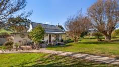 1209 Tallangatta Creek Road Tallangatta Valley VIC 3701 A recognised smaller farm in three (3) main allotments. To be offered as a whole. The property has been in the care of the Gigliotti family for over 60 years and has been well maintained and cared for over their stewardship. The acreage of 97 acres – 39 ha includes both freehold and enclosed roads. Situated in the highly productive Tallangatta Valley “Dandalloo” provides an opportunity to purchase in this strong rural community. The property divides itself into three (3) main categories. The home parcel offers attractive well maintained creek flats with good fencing and water. The neat, well maintained weatherboard cottage (circa 1920’s) provides three (3) bedrooms. Split system in main and outstanding views over the property and hills to the north. The large ‘country style’ kitchen is a central point with a slow combustion wood stove and a split system. The lounge/dining room has a slow combustion wood heater and a split system. Fully refurbished bathroom and laundry. A comfortable home with many original features. The garden and surrounds are established with trees and shrubs and a double lock up garage and shedding. The ‘Dairy’ area of the property can be described as a highly regarded small area of productive creek flat type country with good fencing and water. This area has a disused dairy with power, cattle yards and established trees throughout. On the southern side of the Tallangatta Creek Road is an outstanding allotment comprising low to strong hill. This well cared for pasture improved country offers good water and fencing, this is recognised heavy carrying country. The block has a large hay shed. Water is via spring fed dams and Tallangatta Creek Stock and Domestic plus rainwater. The property offers 29 mega litres of irrigation water. “Dandalloo” offers comfortable living within a quiet, private valley. Rural lifestyle at its best with some productivity.