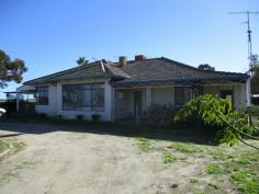 219 Mather Rd Kellerberrin WA 6410 $285,000 This property is worth an inspection plenty to offer. Walk into entrance of this spacious family home with 5 bedrooms new kitchen with electric stove/eating area plus separate dining room, separate lounge with wood fire and split reverse aircon, long sleepout room with concrete floor can be divided into office/bedroom or granny flat with own entrance, immaculate jarrah flooring throughout, insulation, bathroom shower recess vanity wc, laundry plenty of room with second wc new electric hws undercover from garage with roller door concrete floor to laundry, rainwater tanks, front verandah, double carport, many small sheds, 3 horse stables, chook pens, veggie garden, shade house, hayshed, 9x10 shed concrete floor power, fully fenced, NEW bitumen road to property.