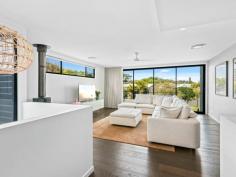 1/21 Hawaii Avenue Palm Beach QLD 4221 This stunning near new home has been architecturally designed to capture a relaxed beachside lifestyle while incorporating modern quality finishes throughout. The kitchen and downstairs living areas face north to a covered alfresco area and courtyard with the dimensions of space and the abundance of light being enhanced by the high voided ceilings. There is a large second living area upstairs which opens to a covered balcony with pleasant views to the south. • Gourmet kitchen with stone tops, quality appliances and butler's pantry; • Two completely separate living areas, built in fire place upstairs; • Custom designer cabinetry throughout; • All bathrooms have luxury finishes with quality tiles and tapware; • Timber flooring throughout the living areas; • Double lockup garage, ducted air conditioning, manicured low maintenance gardens. The home is in an excellent location in a quiet street, within easy walking distance to the beach, Pirate Park, Currumbin Estuary and all the restaurants and cafes that central Palm Beach has to offer. There is also the added bonus of being within the much sought-after P.B.C catchment area.