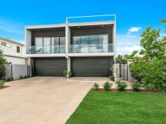 1/21 Hawaii Avenue Palm Beach QLD 4221 This stunning near new home has been architecturally designed to capture a relaxed beachside lifestyle while incorporating modern quality finishes throughout. The kitchen and downstairs living areas face north to a covered alfresco area and courtyard with the dimensions of space and the abundance of light being enhanced by the high voided ceilings. There is a large second living area upstairs which opens to a covered balcony with pleasant views to the south. • Gourmet kitchen with stone tops, quality appliances and butler's pantry; • Two completely separate living areas, built in fire place upstairs; • Custom designer cabinetry throughout; • All bathrooms have luxury finishes with quality tiles and tapware; • Timber flooring throughout the living areas; • Double lockup garage, ducted air conditioning, manicured low maintenance gardens. The home is in an excellent location in a quiet street, within easy walking distance to the beach, Pirate Park, Currumbin Estuary and all the restaurants and cafes that central Palm Beach has to offer. There is also the added bonus of being within the much sought-after P.B.C catchment area.