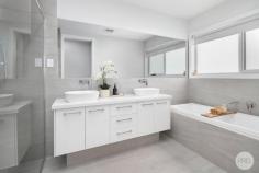 14 Mary Drive Alfredton VIC 3350 $715,000 - $730,000 This stunning family home is sure to impress upon immediate entry, showcasing modern, sophisticated living. Situated on a generous sized allotment of 630m2 (approx) & located in the exclusive Alfredton Central estate, the location & property on offer is of the highest standards & is sure to amaze. • This brand new Hudson Ridge home is a complete family set-up boasting four bedrooms, 3 with BIR's plus the incredible master suite comprising of a huge WIR complete with joinery & a luxurious dual vanity ensuite with separate toilet. • Upon entering through the 1200mm wide front door, the impressive 2.55m high ceilings & feature lighting ooze quality & class and set the tone for the entire property • There are two separate living zones including front formal living room with built-in study nook & entertainment unit plus an open plan family room with premium gas log fire creating a sense of ambience • The kitchen is simply stunning and offers gas & electric cooking, Caesarstone bench tops, breakfast bar & incredible walk-in pantry with plumbed fridge space • Some of the other standout features include ducted heating & refrigerated air conditioning throughout plus quality fittings & fixtures • Beautifully landscaped with low maintenance in mind, there is a large, undercover entertaining area & a separate fire-pit area • Completing this impressive home is the oversized double lock up garage and secure side access to store your caravan, boat or trailer • Ideally located in the Alfredton Central estate, close to multiple high schools, Lucas shopping & the Ballarat Golf Club.