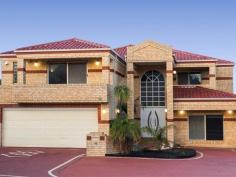 46 Belleview Cres Dianella WA 6059 Situated in the "St Andrews Estate" amongst individual homes of distinction, this quality built 5 bedroom, 3 bathroom, 3 W/C, double storey home with parking for up to 6 vehicles plus picturesque Darling Range views & City glimpses will create a lasting first impression from the moment you arrive! Setting the tone for the grandeur that lies beyond, the stately entry foyer with its double height void, magical chandelier and sweeping staircase will capture your heart. Bathed in natural light, and framed by chandeliers for that added sense of opulence, the large formal lounge and dining space is the perfect spot either for your next dinner party or simply for mum and dad to enjoy a little quiet time, and best of all, it’s only the first of three (yes three!) large living spaces this home offers! Flowing through to the hub of the home, the open plan living, dining and kitchen area, you’ll definitely appreciate the copious amount of space on offer here! Big enough to easily accommodate all your family and friends, there is ample room for everyone to spread out and relax! Boasting granite benchtops, 900mm gas cooktop, extra wide fridge recess, appliance cupboard, breakfast bar and oodles of storage, the open concept ensures no one misses out on the conversation. And if the main living area wasn’t enough, don’t worry, we’ve got you covered! Tucked away off the main living room is a versatile bonus room that can be configured to suit your needs, and would make an ideal home theatre, games room or kids rumpus room. Seamlessly connected with the main living zone, the outdoor alfresco area with built-in gas BBQ has all your entertaining needs covered! Overlooking the below ground pool, this area is sure to be a hit with the whole family! Also located on the ground floor is a handy third bathroom ideal for taking a shower after a dip in the pool. Up the grand staircase to the sleeping quarters, you’ll love the palatial size of the master suite with private balcony that encapsulates the City glimpses. Big enough to accommodate a separate living area, and complete with fully fitted walk-in robe plus lavish en-suite featuring double vanities, corner spa, shower and separate W/C, it’s the ideal haven after a hard day’s work. Fitted with built-in robes plus enjoying its own private balcony, the second bedroom is equally sumptuous, whilst the other two double sized bedrooms are serviced by the neat and practical family bathroom boasting full height tiling plus separate shower and bath. And just when you thought it couldn’t get much better, there’s the location! Positioned in a quiet family friendly street, with the sought after St Andrews Grammar (K-12) only a short stroll down the road, a host of shopping and public transport options, parklands, and freeway access all within close proximity, plus the Perth CBD being within 10kms, the practicality of living here is simply hard to beat! Having been freshly painted and carpeted throughout, and complete with ducted evaporate plus split system air-conditioning, internal shoppers access, solar panels, plus easy care mostly paved gardens, harmonious family living awaits..