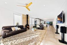 134 Marks Point Rd Marks Point NSW 2280 Live the sea change and water sports lifestyle of relaxation and serenity that you have been dreaming of in this stunning 4/5 bedroom home! Aqua Vista - your pot of gold at the end of the rainbow. Enjoy endless lazy lake days of azure blue plus crimson hues at sunrise and sunset as you soak in the serenity of this blue-chip waterfront offering! This delightful home is coastal, casual and balanced with pure woollen carpets, elegant accents of stone, steel, glass, sandstone and Australian hardwood timbers throughout. An indoor suspended fireplace, outdoor firepit and functional bar area bring this thoughtfully comprised residence together perfectly. Relax on the enormous deck overlooking the water as you bask in the sunshine of this rare position! Being waterfront, backyard activities abound on Swan Bay and greater Lake Macquarie. Boating (deep water moorings available), jet skiing, wakeboarding, sailing, kayaking, stand up paddleboarding, fishing and swimming are all on your rear doorstep. Launch from your own private boat ramp Aqua Vista is only 300m by watercraft to the sand islands and the most popular white-sand beaches on the lake. Marks Point is ideally situated, 2 km from Blacksmiths Beach (a popular 4-wheel driving destination), surf breaks, beach fishing and more! Shopping, restaurants, Charlestown Square and Westfield's Kotara are an easy 15-minute drive. Marks Point Primary School is within walking distance and high schools only 5 minutes by bus. Stroll literally 200m to the local newsagency, post office, take away, community cafe, hairdresser, beautician, massage therapist, art studio, licensed restaurant and sporting club. All this and located just an hour from the end of the M1 freeway at Wahroonga, an easy commute! * While the greater Sydney Lock down is in place we are able to conduct virtual viewings via mobile phone and video call. Please note this will only be by appointment with approved purchasers. Contact our agents to arrange your virtual viewing today