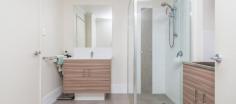 18/42 McLarty Avenue Joondalup WA 6027 $275,000 Built in 2014, you will LOVE this modern, functional apartment that provides a deceptively spacious and well appointed lifestyle opportunity. The quality of the fit out is evident the moment you step through the door. The central hub of the home is a full sized kitchen with stone bench tops, microwave recess, dishwasher space, food pantry and ample overhead cupboards. The master bedroom is KING sized with its own balcony entrance and a walk-through robe concealed by mirrored sliding doors. This is an ideal abode for professionals, students, first home buyers and investors (Current estimated rent return $320-$350p/w). With all the creature comforts one could wish for without time consuming maintenance, this abode makes for the perfect next chapter in your property journey! The quiet complex is conveniently situated within a short distance of all the inner city conveniences and leisurely pursuits whilst also catering for the peace and serenity that this location offers. From Lakeside Joondalup Shopping Centre, North Metro Tafe, Joondalup Hospital, to local eateries, cafes and bars, train station and easy freeway access, your location will not disappoint! THE FEATURES YOU WILL LOVE: High ceilings throughout Full sized kitchen with stone benchtops, overhead cupboards, microwave recess, electric cooktop and oven with range hood, water filtration Study nook with overhead built-in cupboards Open plan kitchen, dining and living areas Quality carpets throughout Sheer roller blinds and block out roller blinds Split system air conditioning Kind sized Master bedroom with ceiling fan Walk through wardrobe with mirrored doors Modern bathroom with laundry Combined washing machine and dryer (included in the purchase price) Large Balcony – accessible from the living area and master bedroom..