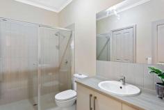 43A Australia Avenue Modbury SA 5092 This sparkling three bedroom Torrens Title home makes smart use of space. It's the ideal starter home for a young family or busy professionals: spend your weekends on fun and relaxation, not upkeep and maintenance! Enter into a welcoming lounge with floating timber floors and extensive built-in storage. At the rear, an open plan living and eat-in kitchen will become the hub of your new home. The space is bathed in natural light from large glass sliding doors opening onto a privately fenced back yard with grassy lawn. The gourmet kitchen is a real delight and sure to please the chef of the household. It features stainless steel appliances including gas cooktop and dishwasher, ample storage and a stylish range hood. The main bedroom enjoys en suite access to a beautiful modern bathroom with sophisticated finishes throughout. All three bedrooms have built-in-robes, and there is a second full bathroom to meet the demands of a busy family. Investors should keep this one on the list, too, thanks to the unbeatable location. Modbury High School is just behind the home, with multiple ovals and reserves within a block. You're an easy stroll to Westfield Tea Tree Plaza and the Interchange, Ardtornish Primary and Modbury Hospital. It's approximately 25 minutes drive to the CBD and less than an hour to the famed Barossa Valley. All the mod cons you'd expect are here, including zoned ducted heating and cooling and a secure garage with electric roller door. All that's left for you to do is move in and unpack! What we love: . Brand new Torrens Title house . Low maintenance block . Immaculate easy care interior . Private yard . Modern kitchen with up-to-the-minute appliances . Two way en suite bathroom . Zoned reverse cycle air conditioning . Three TV points in entry lounge, open plan living and main bedroom . Walk to local schools, Westfield Tea Tree Plaza and Interchange..