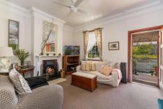 16 Taloumbi Street Maclean NSW 2463 $490,000 - $510,000 This quaint and very charming cottage is located in a prime position within the sought after riverside town of Maclean. The home is spacious in size and is only a short stroll to the Maclean CBD or a hop skip and a jump to the famous Botero coffee Cafe where you can duck out for a fabulous coffee, Breaky or Lunch. The cottage offers 3 bedrooms, a study plus stairs that lead to a loft area with raked ceilings and could be utilized as a 4th bedroom or 2nd living area. The lounge room has high ceilings with a lovely ornate fireplace and the kitchen is neat and boasts a brick feature wall with a separate dining area. The bathroom has been updated and there is a 2nd toilet located on the side verandah. Set on a small 338.7m2 manageable block with low maintenance gardens and yard this attractive old world home is complete with a picket fence and a wide verandah off the front and side of the home where you can sit and watch the world go by.