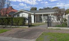 5A Collingrove Avenue Broadview SA 5083 $780,000 This well presented residence comprises entry hall formal living room with adjoining dining/ meals room and adjacent large galley style fully appointed kitchen with Corian bench tops, stainless steel appliances pantry and tons of cupboard and storage space. This combined area makes for a very successful open plan living area with a valuable sunny northerly aspect. Further comprises 4 double bedrooms 2 with built in robes, a three way bathroom with double vanity and bathtub, 2nd separate toilet and laundry. The internal living space is complimented by an extensive pergola covered outdoor entertaining area and private garden accessed by French doors from the dining area. Better living improvements included ducted reverse cycle air conditioning, lockup carport with auto door, rainwater tank, and two garden sheds. Fabulous near city location.