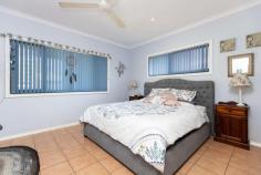 1 Bettong Street Djugun WA 6725 $750,000 This beautiful family home will impress you from the minute you walk onto the property. It has been immaculately presented from the manicured mature gardens to the expansive, functional interior living spaces, superior master suite and the 3 minor bedrooms. Attention to detail is very evident and you can move in knowing you to do not have to do a thing. The kitchen with its freestanding Westinghouse oven, stainless steel dishwasher and corner pantry is very functional, overlooks the tiled open plan living and dining areas and has a view to the outdoor bar and swimming pool. The tiled master suite is spacious and separated from the minor bedrooms via a passageway. It has an ensuite bathroom, a designer walk in robe, air conditioning, fans and quality window treatments. As you meander along the passageway you will find a large laundry, separate toilet and the main bathroom which service another queen size bedroom and 2 minor bedrooms all with tiled floorcoverings, built in robes, air conditioning and fans. The self-contained unit can be accessed via the passageway from the house but also has its own access at the front of the home with its own verandah. This very comfortable unit has a separate bedroom, large bathroom/laundry and expansive living dining and kitchenette zone. A fully functioning out door kitchen on the rear verandah is accessed via the rear sliding doors. Ideal for a 'Granny Flat' or the potential of a choice of income producing options. Shady wide brick paved verandahs are a feature of the home and overlook either the delightful pool area or the beautiful lawns and gardens and are set up to entertain or just relax. A double carport, storeroom under the main roof measuring 4m x 3m and a garden shed add to the many features, too numerous to mention, of this home. Being a corner location, the property has a gated side access should it be required. The home has been loved and well looked after and is ready for the next owner to move in. It is available with vacant possession so get in quick to register your interest for this beautiful home.