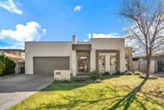 3 Les Edwards Street Forde ACT 2914 *In accordance with ACT Government health guidelines, unfortunately, we will not be conducting in-person open homes or auctions at this time. We will be conducting auctions through our online platform. Please contact your agent for further information.* Beyond its modest facade, this feature filled four bedroom ensuite family residence boasts a generous single level floor plan showcasing ultra modern interiors, destined to impress the modern minimalist. A segregated formal living room is complemented by fluid informal living spaces which feature a modern well appointed kitchen with a huge breakfast bar, creating the ideal focal point for entertaining and family gathering. 'Sunny informality' is the keynote to its space efficient design where large windows reach for the sun and optimise its broad northerly aspect, achieving a supremely comfortable living environment. An enclosed alfresco area with built-in BBQ/kitchen encourages unwinding in style with friends and family. Generous bedrooms, lavish bathrooms, an over-sized double attached garage and a soft palette of internal colours, destined to compliment a variety of furnishings, complete this luxurious offering. Flexible settlement terms available. Features and Inclusions Four bedrooms Ensuite Kitchen Family + meals room Rumpus Enclosed alfresco area with built-in-kitchen Panel heating (2) in alfresco area Three way bathroom Bedroom two BIR sliding door Bedroom three BIR sliding door Bedroom four BIR Under floor (hydronic) heating to kitchen/dining/family/rumpus/entry Fujitsu ducted reverse cycle refrigerated a/c Rheem instantaneous gas hot water Wall insulation R2.0 Ceiling insulation R4.0 Ceiling cavity insulated with anticon blanket Caesarstone bench tops Bosch induction hot plates (4) Bosch microwave & electric wall ovens Bosch plate warmer Two Fisher & Paykel dishwashers Large walk-in-pantry speakers to formal & informal rooms (inc master bedroom) Ducted vacuum Hills Alarm Home hub Intercom Double attached garage Internal access Auto panel lift door Built in cupboards to garage Walk in robe New carpets to formal lounge and master bedroom Freshly painted front exterior & formal lounge room Close to Mulligans Flat nature reserve, parks & local shops Living area 237m2 Garage 46m2 Block 623m2 EER 5.0 FEATURES: • Air Conditioning • Alarm System • Built-In Wardrobes • Close To Shops • Close To Transport • Formal Lounge • Separate Dining..