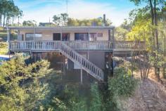  48 Harbour Line Drive Goughs Bay VIC 3723 $420,000 - $450,000 'Bunderra' is the perfect holiday home situated off the main road on a private 960sqm block boarding nature reserve, offering a summer deck with lake views and gorgeous native outlook. There is plenty of under house storage ideal for keeping your boat or cars out of the weather plus a single lock up garage. Inside it is very warm and cosy with a great fireplace and new split system, solid timber kitchen complete with Bosch dishwasher, electric whirlpool free standing oven and pantry. Large windows in the living room capture beautiful lake views, plus two bedrooms both with built in robes and functional main bathroom/laundry complete this perfect rural retreat. • 	 Perfect holiday or air b n b home in private location • 	 Decking with lovely rural vista adjacent to nature reserve • 	 Lovely lake view from the living room • 	 Just moments to the lake and 20 minutes to Mansfield Goughs bay is a sort after location for those who love to ski on the water or rug up for snow in the winter, take advantage of the local state forest with ample 4WD, motorbike tracks to explore! 
