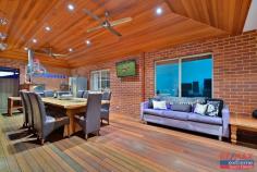 53 Kippilaw Loop Carramar WA 6031 $600,000's to $700,000's Located in a sought after, quiet street nothing compares in terms of size & features to this remarkable 6-bedroom, 2-bathroom residence. Features & benefits include: * Entrance hall * Master bedroom with large walk in robe & ensuite with spa bath, his & hers vanities, shower & separate WC * Formal lounge / games room / home theatre with ceiling fan * Open plan family & meals areas with ceiling fan * Kitchen with walk in pantry, double fridge/freezer recess, shoppers access from the garage & stainless steel appliances including dishwasher * Separate games room currently set up as a home theatre with tiered seating * 5 further spacious bedrooms with built in robes * Activity area * Family bathroom with bath, vanity & shower * 2nd WC * Powder area * Well appointed laundry with bench space, overhead cupboards & large, walk in linen/storage closet * Reverse cycle, zoned Daikin air conditioning for year-round comfort * Amazing, cedar lined outdoor entertainment area with ceiling fans, timber decking, cafe blinds & built in, outdoor kitchen with bench space, cupboards, plumbed sink, built in BBQ on mains gas & rangehood * Solar heated, below ground pool * Garden shed * Reticulation to the front lawn * Double, remote garage * 600sqm block * Close to schools, parks, shops, transport, Carramar Golf Course, The Duke Bar & Bistro & all other local amenities Don’t miss out! Call Team Demo today to arrange your viewing!