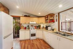 16 Taloumbi Street Maclean NSW 2463 $490,000 - $510,000 This quaint and very charming cottage is located in a prime position within the sought after riverside town of Maclean. The home is spacious in size and is only a short stroll to the Maclean CBD or a hop skip and a jump to the famous Botero coffee Cafe where you can duck out for a fabulous coffee, Breaky or Lunch. The cottage offers 3 bedrooms, a study plus stairs that lead to a loft area with raked ceilings and could be utilized as a 4th bedroom or 2nd living area. The lounge room has high ceilings with a lovely ornate fireplace and the kitchen is neat and boasts a brick feature wall with a separate dining area. The bathroom has been updated and there is a 2nd toilet located on the side verandah. Set on a small 338.7m2 manageable block with low maintenance gardens and yard this attractive old world home is complete with a picket fence and a wide verandah off the front and side of the home where you can sit and watch the world go by.