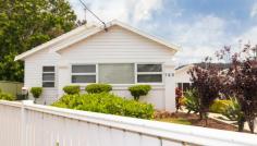 168 Bowman Street Swansea NSW 2281 This beautifully renovated cottage is situated across from Black Neds Bay with views of the water from the sun room and cabana. As you walk in the front door you will straight away be in awe of the light filled sun room leading to the main bedroom complete with built-in robe, ceiling fan and sliding doors opening to the manicured garden. The lounge room is generous in size and offers and open plan feel through to the kitchen. Light filled with ceiling fans and reverse cycle air conditioning. Kitchen is ultra modern with stainless steel appliances and breakfast bench. Second bedroom offers built-robe, ceiling fan and like the main, sliding doors opening to the manicured garden. Situated off the lounge room is the dining room which again is light filled and roomy looking over the backyard. Renovated bathroom with separate toilet. Lots of off street parking perfect for the jet ski and boat as well as the car. CABANA To make this property even more intriguing is the separate cabana which is located at the rear of the block. The cabana offers an abundance of living space, ensuite with shower and washing machine. The cabana also boasts a huge amount of storage/cupboard space all tucked away. Ideal as a teenage retreat or Cave! This property is a delight and close to primary schools, high school, shops and transport, not to mention the beaches and lake, don't wait! The property is currently rented at $550 per week to excellent tenants.