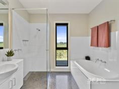 500 Boolarra South-Mirboo N Rd Mirboo North VIC 3871 $1,600,000 An exceptional country gem with sweeping views of the rolling South Gippsland farmland in the Strzelecki ranges. From the moment you turn in the driveway you will be captured by the beauty of this architecturally designed home, which is perfectly positioned on a north facing hill within approx. 38 acres of premium pasture. As well as the spectacular outlook and idyllic lifestyle, this property offers space, comfort, quality and versatility. The heart of the house is an impressive light-filled living/dining/kitchen zone with polished concrete floors, a pitched ceiling and double doors leading out to the front entertaining verandah. The kitchen has heat-proof stone benches throughout, excellent storage, an electric induction cook top, a wall oven and a magnificent Esse slow combustion stove. The central open plan family room leads to two separate wings of the home. The first has a cozy second living room with wood fire, and the most beautiful library, incorporating a work from home office with NBN satellite, Cat6 throughout with patch panel and 4G wireless available. You will never be short of storage options with a designated secure storage room plus floor to ceiling cupboards alongside the laundry that steps out to the rear double carport and a mudroom complete with bathroom facilities. To the end of the hallway is the master bedroom suite with walk in robe, ensuite and sliding doors out to the sheltered corner deck - a perfect space to relax and enjoy the sunrise. In the second wing of the home there are 3 more generously sized bedrooms, all with built-in robes and views, as well as a central bathroom and separate toilet. The living room in this wing is a carpeted family rumpus with wood heater and plenty of space to play. Quality is high throughout this solar passive designed home built to N3 standards with double glazed windows throughout, 5kw Solar (with premium feed in tariff till 2024), three-way hot water systems and water filtration. Along with the wood heaters there are three reverse cycle air conditioners plus so much more that make this 6.3-star home second to none. The low-maintenance gardens blend succulents, ferns, raised vegetable garden beds and fruit trees. Water for the property will never be a problem with 250k of storage. The 28m x 12m barn style shed is fully concreted and wired, an ideal workspace. This 15 ha/38-acre (approx.) property is rolling fertile country with healthy pastures, 6 fenced paddocks, sheep yards, troughs in all paddocks plus two dams. The vendors have operated a successful prime lamb business which may be an option you choose to continue. The property also lends itself to cattle or horses, or you can agist/lease the land to a nearby farmer and simply enjoy the setting and this beautiful home. The property is located an easy 5km bitumen road drive from the growing township of Mirboo North with schools, shops and sporting facilities. It is only 20 minutes to Leongatha, 40 minutes to the beaches of Inverloch and 1hr 50minutes to Melbourne.