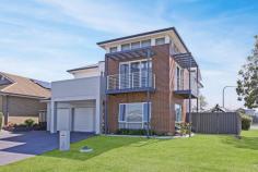 2 Riverside Crescent Haywards Bay NSW 2530 A life of luxury awaits at 2 Riverside Crescent, Haywards bay. Designed for active families who love to entertain, this is the perfect place to enjoy the approaching warmer weather. With high quality finishes throughout and a spacious floorplan that the family will indulge ,this is the ultimate lifestyle experience. Featuring • 4 Large bedrooms (All with built in wardrobes) • Master suite with ensuite and walk in robe • Multiple living areas • Stylish family bathroom • Designer Kitchen with plenty of bench space • Open plan design flowing to the large Alfresco • Alfresco area overlooking in ground pool and lawns • Side access- Off street Boat or Caravan parking • Movie media room • Ducted Air Conditioning • Plenty of natural light • Minutes to north and southbound freeway access • Double garage • 640sqm corner block