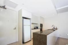 61/22 Eyre St Kingston ACT 2604 $490,000 Kingston Place, positioned in the heart of old Kingston, allows the astute purchaser to have the best of both worlds: a residence with luxury finishes, common sense design and a tranquil position. Finished with a combination of marble tiling, 30mm stone benchtops, Miele appliances, glass splashback, full height and feature tiling to wet areas, ducted heating and cooling, floor to ceiling glass sliding doors and high ceilings. Imagine your new home being within walking distance to the village lifestyles provided by Kingston and Manuka, but also having an expansive, fully enclosed outdoor courtyard that flows seamlessly from the luxury appointed, open plan kitchen/lounge and dining areas - providing you with a peaceful heritage outlook as well as fantastic privacy. Features: - Miele kitchen appliances and premium tapware; - Stone kitchen with waterfall benchtop; - European laundry; - Audio visual intercom entry; - Fully ducted, reverse-cycle air conditioning; - Quality block out curtains; - Ducted reverse-cycle AC; - Underground car parking; - ADSL2 and Foxtel connection points; - Living area of 74 m2; and - Terrace-courtyard of 47 m2.