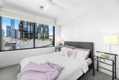 25/125 Melbourne St South Brisbane QLD 4101 A great floorplan with a north easterly aspect, the design allows plenty of natural light and cross ventilation with the apartments corner position in the building. Fish Lane Apartments on the iconic and award-winning Fish Lane is a premium address in Brisbane’s newest foodie precinct! Designed with versatility in mind with the bedrooms separated by the living area and each with it’s own bathroom or ensuite this property would be perfect for professionals wanting to share, couples, students or a small family. Featuring: – 2 spacious bedrooms with built in robes, ceiling fans and reverse cycle air conditioning – Both bedrooms with direct access to a bathroom – One bathroom is dual access from living and a bedroom, the other is an ensuite – Air conditioned throughout – Covered balcony accessed from the living room and the master bedroom – Premium stone kitchen with sleek and clean design – additional bench/storage/study area – Quality European appliances including dishwasher and microwave – Apartment comes fully furnished – just bring your clothes! – Hide away internal laundry and linen cupboard – Built and completed in 2014, apartment is on Level 5 – Secure car space comes with the apartment, with several visitor car parks – Affordable Body Corporate fees Fish Lane Apartments is epitomised by its off-form concrete, timber, brick and glass. The building’s 48 apartments are rightly considered some of South Brisbane’s finest. – 3 resident Sky Lounges (floors: 4 – with electric BBQ plate, 6 and 8) provide ideal entertainment spaces with great views – An easy mid-point to the entertainment options of West End, South Bank and the CBD – all within a 10 minute walk – Restaurants, cafes, eateries and bars within a one block stroll as you are right on Fish Lane itself, while the Pig n Whistle bar and restaurant and a quality IGA market are right across the street. – The CityGlider buses are only a quick step from the downstairs foyer – Part of the Brisbane State High School and West End State School catchments and just a few minutes walk to QUT Gardens Point, Griffith University South Bank and the Qld Conservatorium of Music
