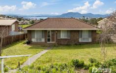 53 Devines Road Glenorchy TAS 7010 Positioned right on the border of West Moonah & Glenorchy with the imposing Mount Wellington and River Derwent as your backdrop, this property will catch the eye of all astute buyers. It would be the ideal addition to any portfolio with a rental estimate of approximately $520-$560 per week or the perfect home for a first homebuyer breaking into the market wanting to add their own touch. Accommodation in this brick home includes a spacious open plan lounge, dining and kitchen, framed beautifully by the stunning water view, three good sized bedrooms upstairs, family bathroom and an ideal teenage retreat downstairs currently utilised as a fourth bedroom and offers a separate access to outside. The space here would also make an ideal second living area or home office. Parking for multiple cars is available at the entrance of the property and at the rear there is a small entertaining area making this a great place to gather with family and friends for BBQ’s or celebrations. The backyard is fully fenced and low maintenance, perfect for pets to roam and for kids to play. It backs onto the Jim Bacon reserve and Springfield Gardens primary school giving the family further opportunity to explore without the need for additional upkeep. The home is within proximity to schools, shopping centres, bus routes and all the conveniences of Northgate, Moonah and Glenorchy. It will not last in today’s hotly contested market!