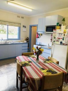 2970 Meeniyan-Promontory Rd Yanakie VIC 3960 Totally secluded on approx. 1 acre with magnificent views out over the adjoining farmland, this is the perfect spot to get away - Shallow Inlet, Corner Inlet, the surf beaches and the gates of Wilsons Prom only minutes away. Flat usable land with two fenced paddocks, race, paddock shelter and established wind breaks - perfect for running a few stock, horses or planting out. Established shade, shelter and fruit trees and a magnificent clipped hedge. Immaculately maintained inside and out with a covered verandah offering just the spot to sit and enjoy the outlook. Open plan light filled interior - cosy in winter with a central wood heater. Country kitchen with dining area and walk in pantry. 3 spacious bedrooms, modern central bathroom plus laundry / utility room and separate w.c. Single garage / workshop, wood shed, room for boat or van parking. If you're seeking a private escape to the country, this might just be the one for you.