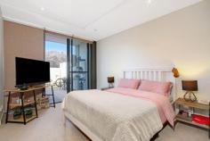 61/22 Eyre St Kingston ACT 2604 $490,000 Kingston Place, positioned in the heart of old Kingston, allows the astute purchaser to have the best of both worlds: a residence with luxury finishes, common sense design and a tranquil position. Finished with a combination of marble tiling, 30mm stone benchtops, Miele appliances, glass splashback, full height and feature tiling to wet areas, ducted heating and cooling, floor to ceiling glass sliding doors and high ceilings. Imagine your new home being within walking distance to the village lifestyles provided by Kingston and Manuka, but also having an expansive, fully enclosed outdoor courtyard that flows seamlessly from the luxury appointed, open plan kitchen/lounge and dining areas - providing you with a peaceful heritage outlook as well as fantastic privacy. Features: - Miele kitchen appliances and premium tapware; - Stone kitchen with waterfall benchtop; - European laundry; - Audio visual intercom entry; - Fully ducted, reverse-cycle air conditioning; - Quality block out curtains; - Ducted reverse-cycle AC; - Underground car parking; - ADSL2 and Foxtel connection points; - Living area of 74 m2; and - Terrace-courtyard of 47 m2.