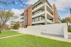 34/18 Kennedy St Kingston Place Kingston ACT 2604 Stage One - Kingston Place, positioned in the heart of old Kingston, offers the astute purchaser the best of both worlds: a near-new residence with luxury finishes, common-sense design features and a tranquil position. Finished with a combination of granite Benches, Gaggenau appliances (including induction cooktop, oven and microwave), glass splash-back, full height and feature tiling to wet areas, built-in shelving for entertainment equipment, ducted heating and cooling, floor-to-ceiling glass sliding doors from both the living room and bedroom, high ceilings and walk-in robe offering plenty of storage and hanging space; this home presents as the ideal residence for the discerning executive couple. Imagine your new home situated conveniently within walking distance to the village lifestyles afforded by Kingston and Manuka, yet also having an expansive, fully enclosed and paved outdoor north-facing courtyard with planter boxes; enabling a seamless flow from the luxury-appointed, open-plan kitchen, lounge and dining areas into your outdoor entertaining areas complete with the serenity and privacy offered by this desirable location. Property sold with vacant possession. Features: • Gaggenau kitchen appliances with induction cooktop, oven and microwave; • Granite benchtop; • Built-in shelving for entertainment equipment and desk area in living room; • Spacious walk-in robe; • Lift access; • Stone bathroom benchtops with double vanity; • European laundry; • Secure building with Audio visual intercom entry; • Fully ducted, reverse-cycle air conditioning; • Ducted reverse-cycle AC; • ADSL2 and Foxtel connection points; • Living area of 72 m2 and Terrace-courtyard of 53 m2; and • One allocated parking space and lockable storage cage in secure underground garage. • Security System