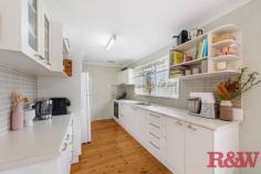 40 Bourbon St Wyoming NSW 2250 A well presented family home in a quiet street of Wyoming with transport and shopping centres close by this home would an array of buyers including the young family, first home buyer, investor or downsizer. - Three bedrooms, main with reverse cycle air conditioning, one with built in robe & all with ceiling fans - Good size main living area which leads into a rumpus room or 2nd living area with air conditioning - Renovated bathroom with wall hung vanity, floor to ceiling tiles, frameless shower screen & bathtub - Well presented galley style kitchen with ample storage - Timber floors throughout the living areas and carpet to the bedrooms - Full length entertaining deck at rear overlooking the large yard and reserve at rear - Internal laundry - Access through a gate to the reserve which leads you onto Alan Davidson Oval so plenty of space for the kids - Single carport and covered deck area to the entry of the home