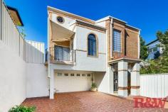 3/136 Broken Bay Rd Ettalong Beach NSW 2257 $1,450,000 - $1,550,000 Located within an easy walk to the Umina Beach shopping strip and only metres to the beautiful sands of the Umina & Ettalong Beaches, is this huge and free-standing 4-bedroom townhouse with ocean views set at the rear in a secure & small auto-gated complex of 3 units. On the top floor is your main living area consisting of an open plan & modern kitchen with stone benchtop & plenty of storage space and a powder room. A generous dining & living area leading out to a large balcony offering great entertaining space with ocean views. The middle floor consists of a second living room opening onto a covered porch, a master bedroom with walk-in wardrobe & a beautiful ensuite with separate shower, bathtub and toilet. This level also accommodates another 3 bedrooms all with built-in wardrobes, one of the bedrooms having its own balcony, the main bathroom and an internal laundry with external access. The ground floor offers space to a large double auto lock up garage with additional room on one side to park a third vehicle or a jet ski & additional beach equipment or simply for storage or workshop. Great bonus on this same level is a third bathroom with shower and toilet, ideal for the after-ocean swim. With features such as double-brick construction, split air conditioning system in master bedroom and main living area, ducted vacuum, intercom, security system and video surveillance, this huge townhouse with the beach only metres away will certainly appeal to those seeking the everyday beach lifestyle the Central Coast offers.