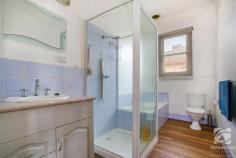 12 Park Street Chiltern VIC 3683 Located in the stunning historic Chiltern, this country cottage style home is only a short stroll to local Schools and the main street of Chiltern. Comprising of three spacious bedrooms suitable for all ages. Central to the bedrooms is the practical bathroom offering a separated shower, single vanity, and bath. The open plan, recently updated kitchen and dining area has a functional layout and modern appliances. The home's living room is ideal for the entire family, offering period windows capturing copious amounts of natural light. Year-round comfort can be assured with split system heating and cooling. The low maintenance yard is ideal for entertaining year-round. Situated at the back of this 879 m2 block is a spacious shed ideal for storing all the toys and tools, while rear yard access ensures the trailer, boat or caravan is kept secure.