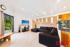 3/136 Broken Bay Rd Ettalong Beach NSW 2257 $1,450,000 - $1,550,000 Located within an easy walk to the Umina Beach shopping strip and only metres to the beautiful sands of the Umina & Ettalong Beaches, is this huge and free-standing 4-bedroom townhouse with ocean views set at the rear in a secure & small auto-gated complex of 3 units. On the top floor is your main living area consisting of an open plan & modern kitchen with stone benchtop & plenty of storage space and a powder room. A generous dining & living area leading out to a large balcony offering great entertaining space with ocean views. The middle floor consists of a second living room opening onto a covered porch, a master bedroom with walk-in wardrobe & a beautiful ensuite with separate shower, bathtub and toilet. This level also accommodates another 3 bedrooms all with built-in wardrobes, one of the bedrooms having its own balcony, the main bathroom and an internal laundry with external access. The ground floor offers space to a large double auto lock up garage with additional room on one side to park a third vehicle or a jet ski & additional beach equipment or simply for storage or workshop. Great bonus on this same level is a third bathroom with shower and toilet, ideal for the after-ocean swim. With features such as double-brick construction, split air conditioning system in master bedroom and main living area, ducted vacuum, intercom, security system and video surveillance, this huge townhouse with the beach only metres away will certainly appeal to those seeking the everyday beach lifestyle the Central Coast offers.