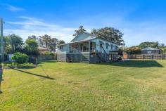 9 Tweed Valley Way Condong NSW 2484 $730,000-$770,000 If you are looking for some additional space between you and your neighbours, then look no further! The block size of this property is just over 1200m2 meaning the yard is certainly big enough to house all your toys, has plenty of room some free-range chooks to wander around and still space for a pool to be added down the track. This sizeable home has a real "country farm house" feel to it and offers two separate living rooms and an additional sunroom. With so many living areas, there is more than enough space for the whole family. All four bedrooms are spacious and the family sized bathroom has only recently been renovated. The kitchen is a large u-shaped configuration and is in original condition. This leaves scope for the buyer to carry out some renovations and add their own personal touch to the property. The rear deck overlooks the cane fields and you are only minutes away from the local primary school and Tweed River and are just 6 minutes drive to down town Murwillumbah. Property features include: - Two living areas plus sunroom (one of those living rooms could easily become a 5th bedroom if you needed the extra space) - Four good sized bedrooms, all with ceiling fans, two with built-in-robes - Air conditioned loungeroom - Timber flooring throughout - Fully fenced 1207m2 block - Laundry under house in an enclosed storeroom - Ample room under house for at least two if not three cars plus additional carport - Gas hot water system - Chook pen / garden shed - Vegetable garden