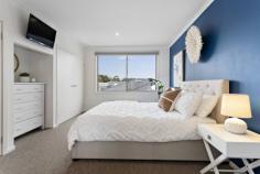 72 Oceanic Dr Safety Beach VIC 3936 Superbly spacious and wonderfully light, this quality double-storey home immediately delights with epic proportions, oozing on-trend finishes and effortless design. Positioned within a prestigious pocket of Safety Beach, enjoy picturesque views from all angles, from Mount Martha to Arthurs Seat. Take in all the area has to offer with a leisurely stroll to Martha Cove Marina, lush parklands, multiple playgrounds, and the sunny shores of Safety Beach. This stunning home, set on a 514sqm (approx.) corner allotment, is a glamorous setting for everyday living and vibrant indoor-outdoor entertaining. Double front doors and a light-filled void-style entrance instantly impresses, before a warm and cosy private lounge (GFP) and sizeable home office draws your eye and invites you further inside. A commodious living and dining domain flows effortlessly into the rear yard for seamless indoor-outdoor entertaining, while anchoring the rear, a spacious kitchen hosts guests over an island bench, catering with a full array of Miele appliances and an abundance of storage. An enlightened staircase embraces the surrounding natural landscape, a theme that continues throughout the second storey, sporting scenic views from all four spacious bedrooms (BIRs) and the casual lounge. The impressive master suite sports a stylish ensuite, whilst the remaining bedrooms are serviced by a central family-sized bathroom comprising double vanity and separate W/C. This home entertains guests in supreme style, offering a well-maintained backyard featuring a tree-lined periphery, a Balinese-style hut extending from a sizeable alfresco area and built-in bench seating; this cleverly planned outdoor area is fit for seasoned year-round entertaining. Luxury inclusions comprise; Blackbutt timber flooring, GDH, evaporative cooling, under-stair storage, laundry with side access and a two-car garage with internal access. Delivering effortless, low-maintenance appeal, this gorgeous home indulges a laid-back lifestyle, setting the standard in prestigious living and peninsula life. Centrally located to all the spoils offered by the glorious peninsula, this home is minutes to easy freeway access, award-winning wineries, bustling cafe strips and world-class golf courses.