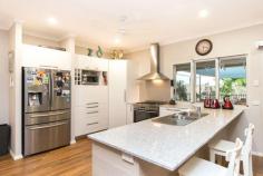 12 Dunnart Crescent Djugun WA 6725 $839,000 This outstanding family home will tick all the boxes for your family! Built in 2014 to a high-quality specification by Custom Lifestyle Homes, the home presents extremely well and boasts a wonderful family focused floor plan that will especially suit growing families who need the space to spread out! A separate lounge at the front of the home compliments the huge open plan living/kitchen/dining space where triple stacker doors open out onto the expansive alfresco area and towards the stunning swimming pool. The gourmet kitchen features high quality appliances, cabinetry and a quality stone benchtop. There is also a large servery to make outdoor entertaining a breeze. There are four bedrooms including the spacious master suite, as well as a 5th bedroom/study at the front of the home. Outside the impressive pool area lies adjacent to a large area of lawn - ideal for kids and pets to play. There is also a decent size garden shed, outdoor shower and best of all a mature KP mango tree! Families with boats, caravans and other toys will find there is plenty of secure vehicle storage both behind the gates and at the front of the home. There is also a handy, lockable store room at the front of the property.