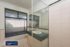 77 Clayton St Bellevue WA 6056 $374,000 Are you looking four more? Surprisingly spacious, this freshly refurbished home has four bedrooms and four living areas including a large kitchen/dining area plus family room, formal lounge and activity room giving you space to spread out and relax. Sitting neatly on a 476sqm front block, this easy-care property is conveniently located on the edge of Midland, just minutes from the new hospital, train and commercial precinct. 4 bedrooms 2 bathrooms Surprisingly spacious t/out Open plan kitchen/dining Plush comfortable lounge Bright family & activity rm Two paved alfresco patios Securely fenced, easy care Convenient 476sqm block Close to bus & hospital From the bus stop out the front to the hospital down the road, this is an incredibly convenient location with excellent access and connection to major arterial roads. Yet step inside this Federation-style brick and tile home and the world outside will melt away to the Great Indoors. Start your weekend morning cooking a lazy breakfast in the spacious red brick and Jarrah kitchen where there’s room to add an island bench or country table and chairs. It has an electric oven, grill, gas cooktop and built-in pantry. Relax in the dining area with its high ceilings and reverse cycle air-conditioning to read the paper. Or perhaps wander into the family room with a cuppa to enjoy the natural light, which streams in through the bank of glazing on the external wall. A large picture window facing the kitchen affords a clear sight line without the noise. New carpet has been laid in the family room, formal lounge room and the bedrooms. The master bedroom sits opposite the comfortable lounge by the front door and has a bay window overlooking the garden, a reverse cycle air-conditioner, walk-in robe and ensuite. The fresh junior bedrooms have built-in robes and alcoves in most and share a central open activity/play area, a family bathroom and laundry. There’s enough garden to soften the edges of the well fenced brick paved surrounds, alfresco patio and single carport with barely a thought to its maintenance. Run a lawnmower over the small patch of lawn at the front and your weekend gardening jobs list is complete. With the Helena River, the Swan Valley, Midland and airport links on your doorstep, this fantastic home offers facility well beyond its price tag. Great for investors or no fuss family living.