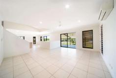 16 Parker Road Cannonvale QLD 4802 - 330m2 of house - awesome entertainment deck with water feature - spectacular relaxing views of the lake, parkland and mountains - close to shopping centre and handy to everything - multi-level modern home - fully air-conditioned - 4 kingsize bedrooms (all with built in robes) - 2 bathrooms (master ensuited and main separate from toilet) - gourmet kitchen with gas cooktop and granite bench tops - living area with access to the entertainment deck - walk through study - terraced yard complete with above-ground garden beds, and fruit trees. - double lock up garage complete with storage areas both sides plus under stairwell storage room - man's cave in undercroft The home was built in 2008 by Canfell Constructions. It is 330m2 in area.
