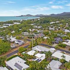 3 Trivia Street, Palm Cove, QLD 4879 HOUSE FOR SALE IN PALM COVE STUNNING BEACHSIDE PAVILION RESIDENCE AT AN EXCLUSIVE ADDRESS 4 Beds 2 Baths 2 Cars An immaculately presented home in the heart of the Golden Triangle of Palm Cove where the Mediterranean meets Tropical North Queensland. The blending of architecture with bespoke design features and stylish decor makes this elegant residence a cut above the rest. Located opposite Tom McDonald Park, and just a three-minute stroll to Cairns' premier beach, this home is in the best street, in the best suburb, north of Brisbane. Designed and built by Chris Blanche, this breathtaking private residence comprises two pavilions where its engagement with the tropical surrounds welcomes the outdoors in, all year round. The impressive entrance entices you across an enchanting timber bridge over twin fishponds surrounded by exotic tropical plants, setting the tone and welcoming you into an open courtyard between the two pavilions. The front pavilion houses the open kitchen, lounge, dining, and covered alfresco entertaining areas, all of which overlook the pool, the spa and the lush tropical verge surrounding the property. The rear two level pavilion features three ground floor bedrooms, bathroom, laundry, guest toilet and ample storage; while the parent's retreat master bedroom is on the upper level complete with WIR and ensuite. This level has wrap around windows offering a picturesque view across to leafy expanse of Tom McDonald Park, a view which is framed by the large Pandanus palms directly below. This beautiful home lends itself to entertaining in style as the front pavilion houses natural timber concertina and French doors that open onto the covered patio and terracotta tiled pool area, opening the entire living area up and inviting the outdoor ambience in. With a recent kitchen makeover, the installation of solar heating. LED lighting, eco ceiling fans and window tinting, this home is perfect for families and friends to enjoy being part of the Palm Cove luxe resort lifestyle. There is so much to love: A fully fenced 700 m2 block with professionally designed gardens, complete with fully functioning water reticulation system Bespoke wrought iron gates and ironwork by Elefantus Double remote garage with lots of storage Solar panels installed Heat resistant protective paint applied to roof High ceilings throughout and wide walkways Fully air conditioned Kitchen with breakfast bar, gas cooking, and granite bench tops Extensive custom-made timber windows, louvres and doors Security and insect screens Just a short stroll from your new home is the beautiful palm fringed esplanade of Palm Cove where you will find an array of fine dining restaurants, casual cafes and boutique shopping. Ray White Smithfield For your private inspection, contact: Matthew Pearce 0418 708 758 Simon Batt 0400 932 229 Land: 700m² / 0.17 acres Parking: 2 garage spaces Bedrooms: 4 Bathrooms: 2