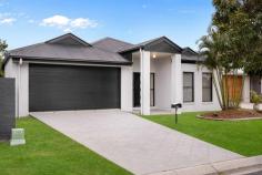 17 Ningaui Crescent North Lakes QLD 4509 Freshly Painted - Tick! Freshly Laid Carpet - Tick! Vacant - Tick! Modern functionality, and a representation of fantastic family living. This home is located within the Bridgehaven estate, plotted on a 476m2 and is complete with all the amenities fit for a family household. Whilst only a short distance from Bounty Boulevard State School, Aurora Boulevard Park, and Hilltop Shopping Centre, accessible by a plethora of bus stops and walking tracks. Beyond the chic facade lies a prudent floorplan, with four bedrooms, two bathrooms, and two living areas leading onto an expansive, alfresco area overlooking the well-appointed yard. The practical, brilliant kitchen includes a gas stove top, breakfast bar, and stainless-steel appliances complemented by the ample benchtop space for preparation, whilst showered by a bundle of natural light. The master bedroom features a walk-in wardrobe, ensuite and a separate air-conditioner, secluded to the back of the home from the remaining bedrooms - comprised of built-in wardrobes and ceiling fans. Cleverly positioned, the main bathroom provides access in the middle of the home, and a separate doorway to one of the bedrooms for ease of access. Perfect for young children or elderly family members! Other features you'll love include: Several Air-conditioning Units - Master bedroom, Spare Bedroom & Living Room Remote double garage with high garage door! Ceiling fans throughout Low maintenance and fully fenced Internal laundry with outdoor access